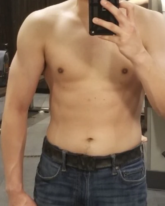 Face-cropped client progress photo, after.